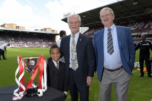 Pitchside with David Gold and nephew Michael