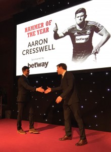 Aaron Cresswell coming up to receive his 'Hammer Of The Year' Award